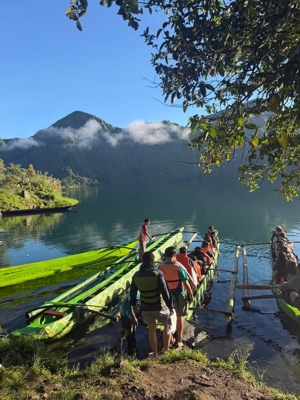Guests boarding canoes at the Lake Holon dock